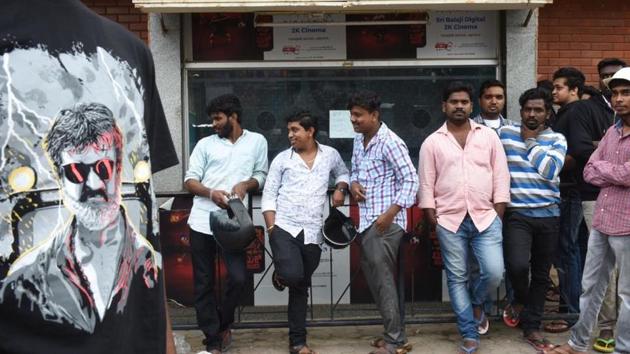 Movie goers and fans wait to buy tickets for Rajinikanth’s Kaala movie at Balaji theatre in Bengaluru on Thursday. Pro-Kannada groups staged protests outside the theatre, leading to the shows being cancelled. (Arijit Sen/HT Photo) Movie goers and fans wait to buy tickets for Rajinikanth’s Kaala movie at Balaji theatre in Bengaluru on Thursday. Pro-Kannada groups staged protests outside the theatre, leading to the shows being cancelled. (Arijit Sen/HT Photo)