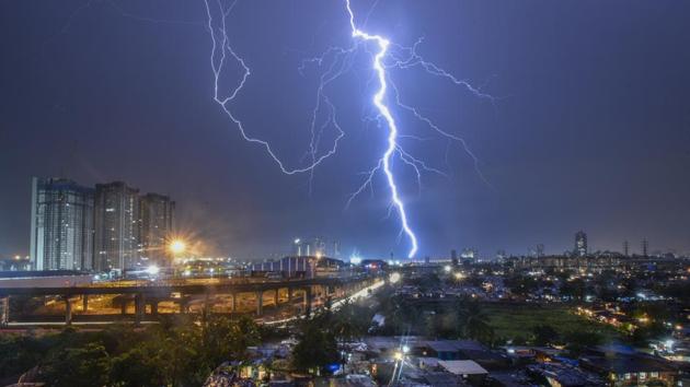 Strong lightening hits the skyline followed by heavy rain in Mumbai, Maharashtra, on June 04, 2018. (Kunal Patil / HT Photo) Strong lightening hits the skyline followed by heavy rain in Mumbai, Maharashtra, on June 04, 2018. (Kunal Patil / HT Photo)