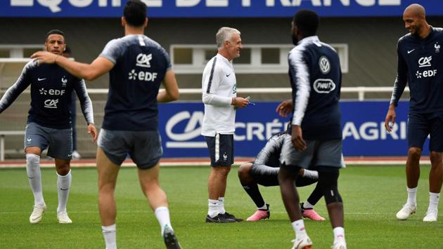France's head coach Didier Deschamps (C) speaks with France's national football players. (AFP) France's head coach Didier Deschamps (C) speaks with France's national football players. (AFP)