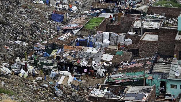 With more than 16 million people (2011), New Delhi and its surrounding cities produce an estimated 17,000 tons of trash daily, according to Indian officials and environmentalists. That requires immense dumps, hills of stinking trash that measure up to 50 meters tall. Last year, two people were killed when a large part of the Ghazipur landfill crashed down onto them. (Altaf Qadri / AP) With more than 16 million people (2011), New Delhi and its surrounding cities produce an estimated 17,000 tons of trash daily, according to Indian officials and environmentalists. That requires immense dumps, hills of stinking trash that measure up to 50 meters tall. Last year, two people were killed when a large part of the Ghazipur landfill crashed down onto them. (Altaf Qadri / AP)
