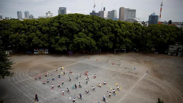 Elementary school students practice for the upcoming sports day at Kanagawa Korean School in Yokohama, Japan. Ethnic Koreans in Japan loyal to Pyongyang hope next week’s US-North Korea summit will help bring reconciliation on the Korean peninsula and clarify their own murky legal status. Their optimism follows April’s summit in Panmunjeom between North and South Korea. (Kim Kyung-Hoon / REUTERS) Elementary school students practice for the upcoming sports day at Kanagawa Korean School in Yokohama, Japan. Ethnic Koreans in Japan loyal to Pyongyang hope next week’s US-North Korea summit will help bring reconciliation on the Korean peninsula and clarify their own murky legal status. Their optimism follows April’s summit in Panmunjeom between North and South Korea. (Kim Kyung-Hoon / REUTERS)