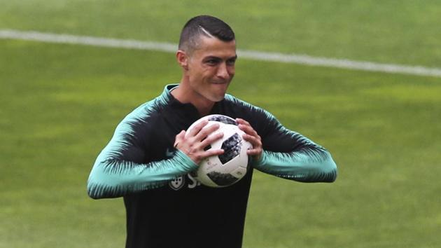 Portugal's Cristiano Ronaldo are placed in Group B at the FIFA football World Cup in Russia.(AP) Portugal's Cristiano Ronaldo are placed in Group B at the FIFA football World Cup in Russia.(AP)