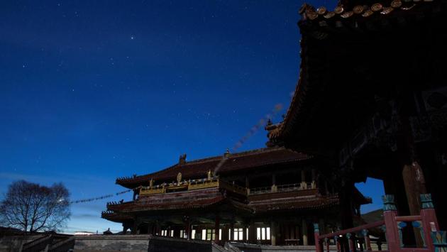 Stars twinkle over the Buddhist Monastery during a moonlit night. Amarbayasgalant Monastery, whose name means “monastery of the quiet felicity” is located near the Selenge River at the foot of Mount Burenkhan. It is one of the rare monasteries that have partly avoided the destruction of 1937 by the Soviets. (Thomas Peter / REUTERS) Stars twinkle over the Buddhist Monastery during a moonlit night. Amarbayasgalant Monastery, whose name means “monastery of the quiet felicity” is located near the Selenge River at the foot of Mount Burenkhan. It is one of the rare monasteries that have partly avoided the destruction of 1937 by the Soviets. (Thomas Peter / REUTERS)