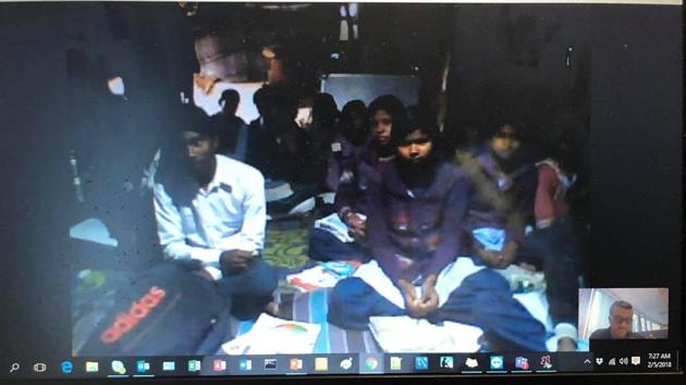 Students of Chandra High School in Bengal’s Bankura district attending classes by teachers based in distant cities before the board exams that began in March. (HT Photo) Students of Chandra High School in Bengal’s Bankura district attending classes by teachers based in distant cities before the board exams that began in March. (HT Photo)