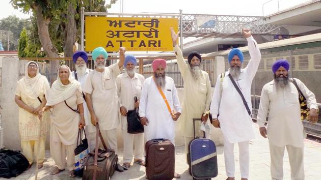 Sikh pilgrims at Attari railway station before leaving for Paksitan to observe Shaheedi Gurpurb of fifth Sikh guru Arjan Dev, on Friday. (HT Photo) Sikh pilgrims at Attari railway station before leaving for Paksitan to observe Shaheedi Gurpurb of fifth Sikh guru Arjan Dev, on Friday. (HT Photo)