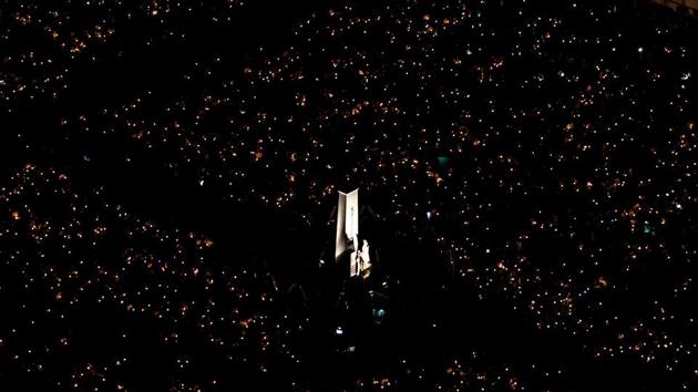 Thousands take part in an annual candlelight vigil to commemorate the protesters killed in Beijing's Tiananmen Square in 1989, at Victoria Park in Hong Kong. (Anthony Kwan / Getty Images)