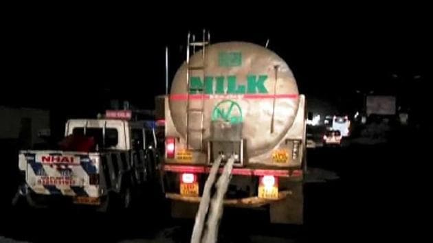 Milk is spilt on the road at Khed Shivapur in Pune on June 1. (HT FILE) Milk is spilt on the road at Khed Shivapur in Pune on June 1. (HT FILE)