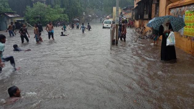 Photos: Southwest monsoon brings Mumbai at halt, leaving roads ...