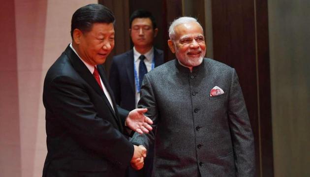 Prime Minister Narendra Modi and Chinese president Xi Jinping held a bilateral meeting in Qingdao on the sidelines of the SCO summit.(PIB/Twitter)