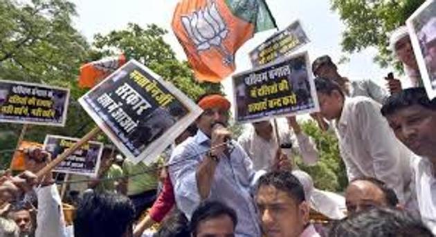 BJP workers agitating in New Delhi against the death of party worker Trilochan Mahato in Bengal on June 1, 2018. (HT Photo) BJP workers agitating in New Delhi against the death of party worker Trilochan Mahato in Bengal on June 1, 2018. (HT Photo)