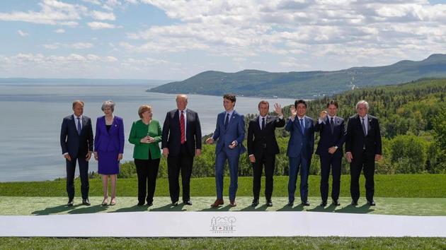 From left to right: European Council President Donald Tusk, Britain's Prime Minister Theresa May, Germany's Chancellor Angela Merkel, US President Donald Trump, Canada's Prime Minister Justin Trudeau, France's President Emmanuel Macron, Japan's Prime Minister Shinzo Abe, Italy's Prime Minister Giuseppe Conte and European Commission President Jean-Claude Juncker pose for a photo at the G7 Summit in the Charlevoix city of La Malbaie, Quebec, Canada, on Friday. (Reuters photo) From left to right: European Council President Donald Tusk, Britain's Prime Minister Theresa May, Germany's Chancellor Angela Merkel, US President Donald Trump, Canada's Prime Minister Justin Trudeau, France's President Emmanuel Macron, Japan's Prime Minister Shinzo Abe, Italy's Prime Minister Giuseppe Conte and European Commission President Jean-Claude Juncker pose for a photo at the G7 Summit in the Charlevoix city of La Malbaie, Quebec, Canada, on Friday. (Reuters photo)