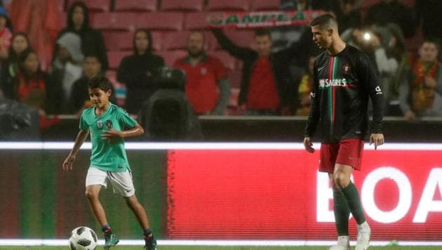 Cristiano Ronaldo’s son Cristianinho received some of the biggest cheers of the night from the Estadio da Luz crowd(REUTERS) Cristiano Ronaldo’s son Cristianinho received some of the biggest cheers of the night from the Estadio da Luz crowd(REUTERS)