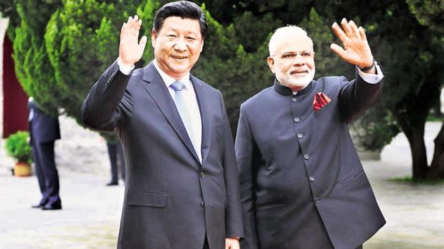 Ties between India and China hit a rough period last year following the military standoff in Doklam. However, Modi and Xi met for nearly 10 hours in less than two days this April during an informal summit in Wuhan, leading to, according to diplomats, “strategic communication” and consensus between the two leaders. (Reuters File Photo) Ties between India and China hit a rough period last year following the military standoff in Doklam. However, Modi and Xi met for nearly 10 hours in less than two days this April during an informal summit in Wuhan, leading to, according to diplomats, “strategic communication” and consensus between the two leaders. (Reuters File Photo)