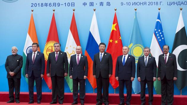 From left: Prime Minister Narendra Modi, Kyrgyz President Sooronbay Jeenbekov, Tajikistan President Imomali Rakhmon, Russian President Vladimir Putin, Chinese President Xi Jinping, Kazakh President Nursultan Nazarbayev, Uzbekistan's President Shavkat Mirziyoyev and Pakistani President Mamnoon Hussain pose for a photo prior to their talks at the Shanghai Cooperation Organization Summit in Qingdao in China on Sunday. (AP photo) From left: Prime Minister Narendra Modi, Kyrgyz President Sooronbay Jeenbekov, Tajikistan President Imomali Rakhmon, Russian President Vladimir Putin, Chinese President Xi Jinping, Kazakh President Nursultan Nazarbayev, Uzbekistan's President Shavkat Mirziyoyev and Pakistani President Mamnoon Hussain pose for a photo prior to their talks at the Shanghai Cooperation Organization Summit in Qingdao in China on Sunday. (AP photo)