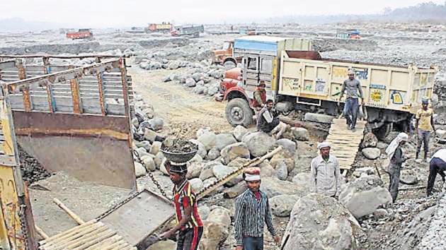 The villagers said that the debris was not only affecting the river’s ecosystem, but also causing floods in the area. (HT File) The villagers said that the debris was not only affecting the river’s ecosystem, but also causing floods in the area. (HT File)