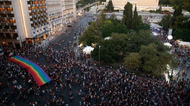 A rainbow flag is seen in front of the Parliament building during a Gay Pride parade in Athens, Greece on June 9.(REUTERS)