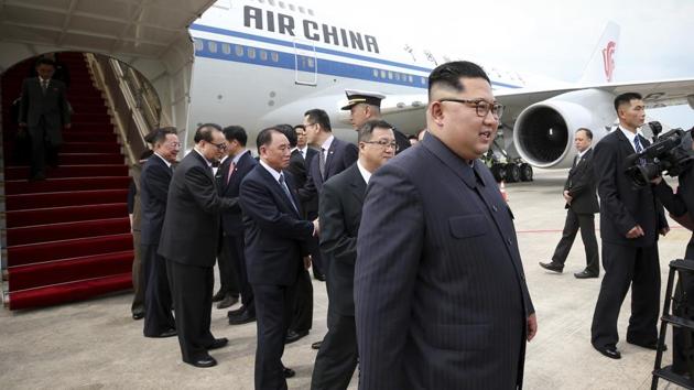 In this photo released by the Ministry of Communications and Information of Singapore, North Korean leader Kim Jong Un, right, arrives at the Changi International Airport, June 10, 2018, in Singapore ahead of a summit with US President Donald Trump.(AP Photo)