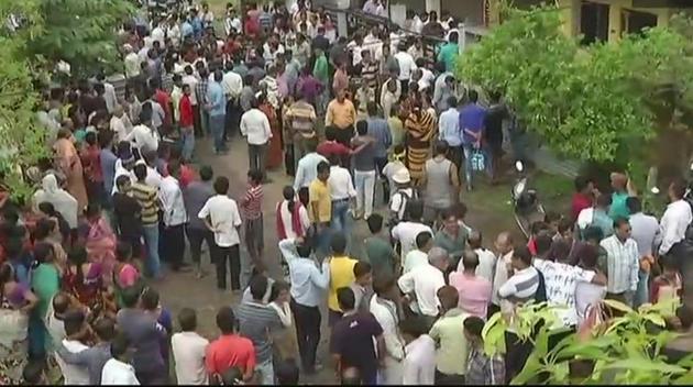 People gather outside BJP worker Kamlakar Pawankar’s residence in Nagpur on Monday. (ANI Photo/Twitter) People gather outside BJP worker Kamlakar Pawankar’s residence in Nagpur on Monday. (ANI Photo/Twitter)