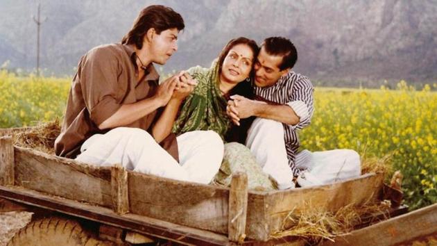 Shah Rukh Khan, Rakhee and Salman Khan in Karan Arjun.