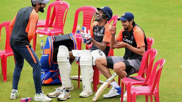Indian cricket team players Ravindra Jadeja, Hardik Pandya and Ishant Sharma share a light moment during a practice session ahead of their maiden cricket test match against Afghanistan in Bengaluru. Afghanistan will become just the 12th nation to play Test cricket when they take on India on Thursday. (Shailendra Bhojak / PTI)