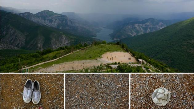 An open clearing surrounded of mountains in the village of Gurgurnica, 35 km away from the nearest city of Tetovo, Macedonia is shared by a basketball court, and an improvised football pitch. A tattered ball and shoes that are fraying don’t mean a game can’t be played. (Ognen Teofilovski / REUTERS)