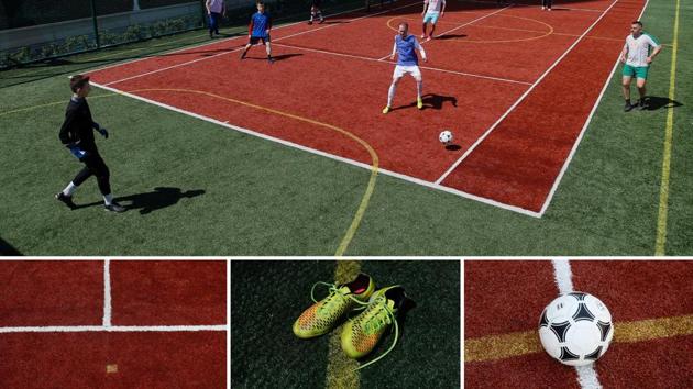 Moscow’s one of 11 host cities lending venues to the 2018 FIFA World Cup. Elsewhere in the city, this playground, while not on the official list, is ready to serve tennis fans should need arise. For now, football has it picked. (Maxim Shemetov / REUTERS)