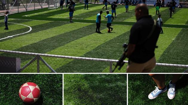 People play soccer prior to the inauguration of a new sports complex (top) at La Campanera Neighborhood in Soyapango, El Salvador. A relaxed game of football manages to divert young minds away from the neighbourhood’s constant gang violence. (Jose Cabezas / REUTERS)