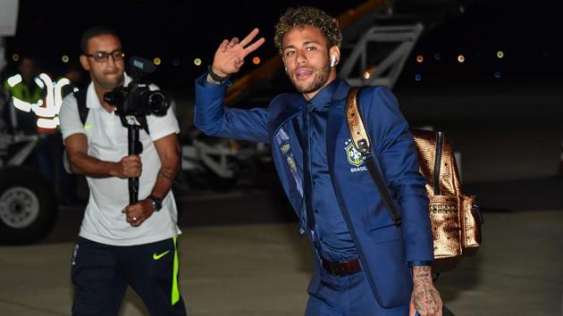 Brazil's forward Neymar gestures upon the team's landing at Sochi airport, in Russia ahead of the FIFA World Cup 2018 (AFP)