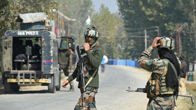 Paramilitary troopers stands guard after a gunfight with militants in Kashmir. (AFP File Photo) Paramilitary troopers stands guard after a gunfight with militants in Kashmir. (AFP File Photo)