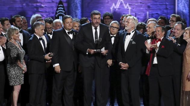 Orin Wolf, center, and the cast and crew of ‘The Band's Visit’ accept the award for best musical at the 72nd annual Tony Awards at Radio City Music Hall.(Invision) Orin Wolf, center, and the cast and crew of ‘The Band's Visit’ accept the award for best musical at the 72nd annual Tony Awards at Radio City Music Hall.(Invision)