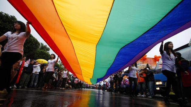 Participants hold a giant rainbow flag during the Taiwan Gay Pride Parade in Taipei October 30, 2010. Around 10,000 Taiwanese gathered with people from Malaysia, Korea and Japan on Saturday for the annual gay pride parade which is in its eighth year, according to organisers. (REUTERS Representative Photo) Participants hold a giant rainbow flag during the Taiwan Gay Pride Parade in Taipei October 30, 2010. Around 10,000 Taiwanese gathered with people from Malaysia, Korea and Japan on Saturday for the annual gay pride parade which is in its eighth year, according to organisers. (REUTERS Representative Photo)