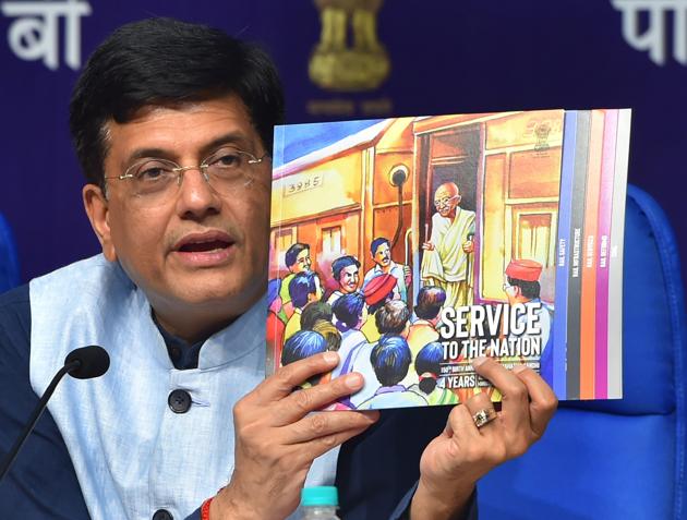 Railway minister Piyush Goyal shows a publication while speaking during a press conference on the achievements of the ministry in the last four years, in New Delhi on Monday. (PTI Photo) Railway minister Piyush Goyal shows a publication while speaking during a press conference on the achievements of the ministry in the last four years, in New Delhi on Monday. (PTI Photo)