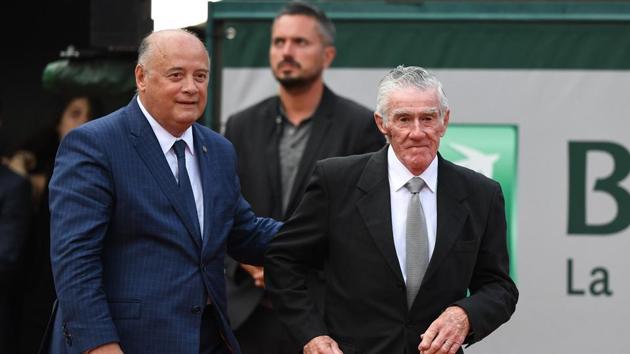 President of the French Tennis Federation (FFT) Bernard Giudicelli (L) and former Australian tennis player Ken Rosewall, arrive for the awards ceremony. (AFP) President of the French Tennis Federation (FFT) Bernard Giudicelli (L) and former Australian tennis player Ken Rosewall, arrive for the awards ceremony. (AFP)