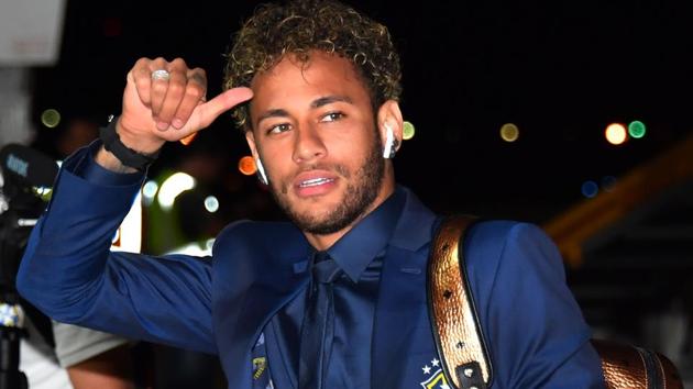 Brazil's forward Neymar gestures upon the team's landing at Sochi airport, in Russia on June 11, 2018, ahead of the FIFA World Cup.(AFP)