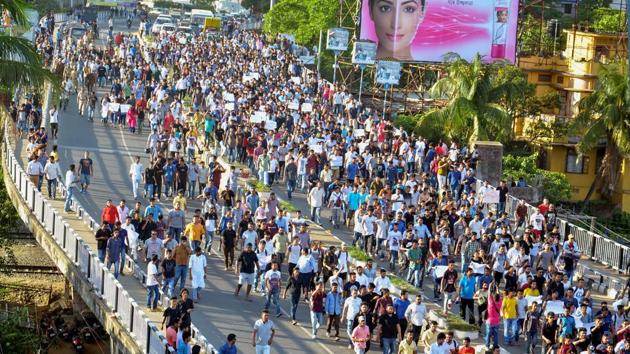 People protest against the lynching of two men in Assam’s Karbi Anglong district on suspicion of being 'child lifters', in Guwahati.(PTI File Photo)