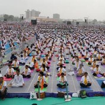 Prime Minister Narendra Modi will lead the international yoga day main event at the sprawling Forest Research Institute ground in Dehradun on June 21.(HT File Photo)