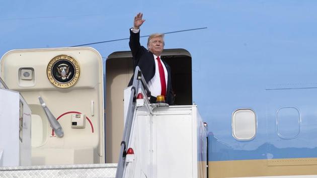 In this photo released by the Ministry of Communications and Information, Singapore, U.S. President Donald Trump waves as he boards Air Force One following a summit with North Korean leader Kim Jong Un Tuesday, June 12, 2018, in Singapore. (AP) In this photo released by the Ministry of Communications and Information, Singapore, U.S. President Donald Trump waves as he boards Air Force One following a summit with North Korean leader Kim Jong Un Tuesday, June 12, 2018, in Singapore. (AP)