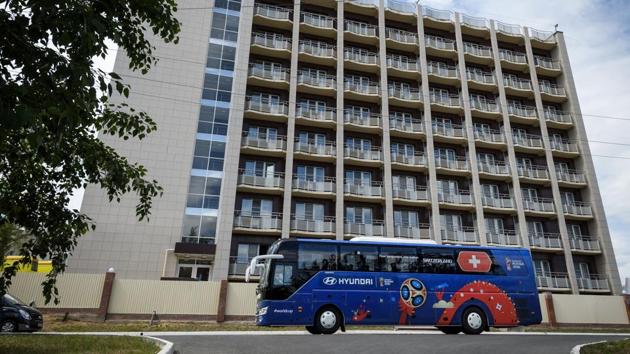 The official bus carrying the Switzerland's national football team drives past the Lada Resort hotel in Tolyatti ahead of the Russia 2018 World Cup.(AFP)