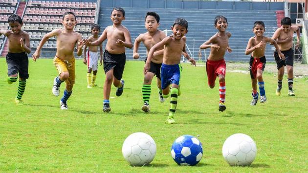 Young footballers in Guwahati practice the sport at a coaching centre as FIFA fever grips various parts of the country, June 6, 2018(PTI)