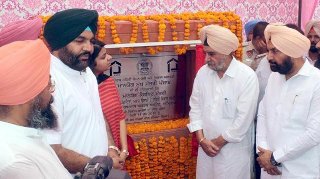 Punjab rural development minister Tript Rajinder Bajwa and MP Gurjit Singh Aujla (second from left) laying the foundation stone of a new colony in Amritsar.(HT Photo)