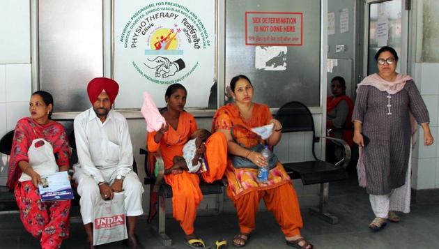 Patients and attendants await their turn for ultrasound scan tests at the civil hospital in Bathinda.(Sanjeev Kumar/HT)