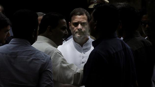 A magistrate court in Bhiwandi, Maharashtra, framed charges against Congress president Rahul Gandhi on Tuesday in a criminal defamation case filed by an RSS worker. Speaking to the media outside court premises, Gandhi said, “Let them (the BJP and the RSS) slap as many cases as they want against me. Ours is a fight of ideology. We will fight them and win.” (Rafiq Maqbool / AP)