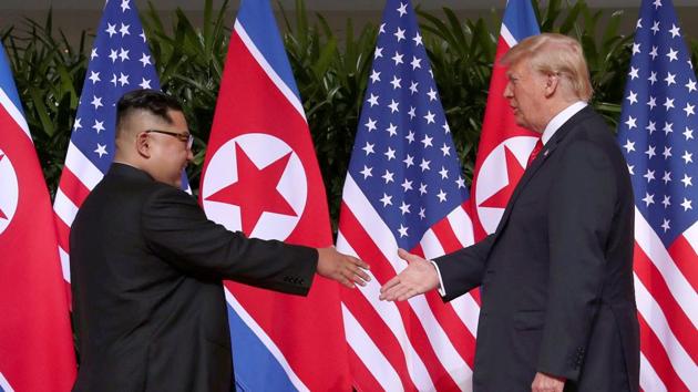US President Donald Trump with North Korean leader Kim Jong Un at the Capella Hotel on Sentosa island in Singapore June 12, 2018. (Reuters)