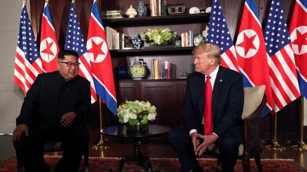 US President Donald Trump sits next to North Korea's leader Kim Jong Un before their bilateral meeting at the Capella Hotel on Sentosa island in Singapore June 12, 2018. (Reuters Photo) US President Donald Trump sits next to North Korea's leader Kim Jong Un before their bilateral meeting at the Capella Hotel on Sentosa island in Singapore June 12, 2018. (Reuters Photo)
