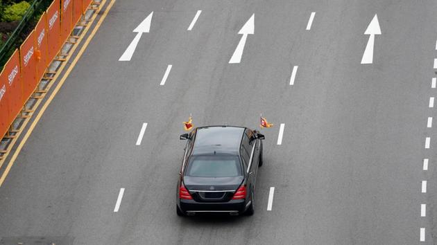 The motorcade of North Korean leader Kim Jong Un travels towards Sentosa for his meeting with US President Donald Trump in Singapore. (Edgar Su / REUTERS)