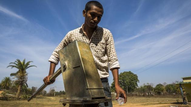 Bhuneshwar Patel, 25, has been working on water testing, conducting water-based surveys and thus ensuring clean water access for the villagers as part of the approach. Water sources, such as handpumps, are tested twice a year (pre and post monsoons) before their status is reported. (Prashanth Vishwanathan / WaterAid)