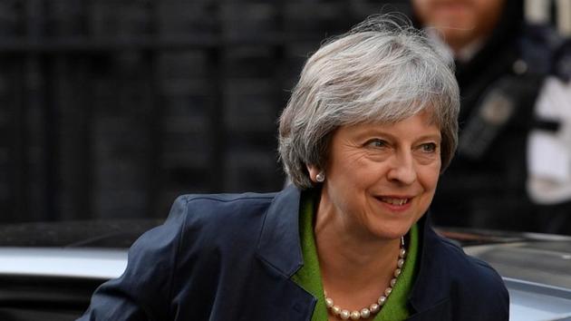 Britain's Prime Minister Theresa May returns to Downing Street from the Houses of Parliament in London, Britain, June 12, 2018.(REUTERS) Britain's Prime Minister Theresa May returns to Downing Street from the Houses of Parliament in London, Britain, June 12, 2018.(REUTERS)