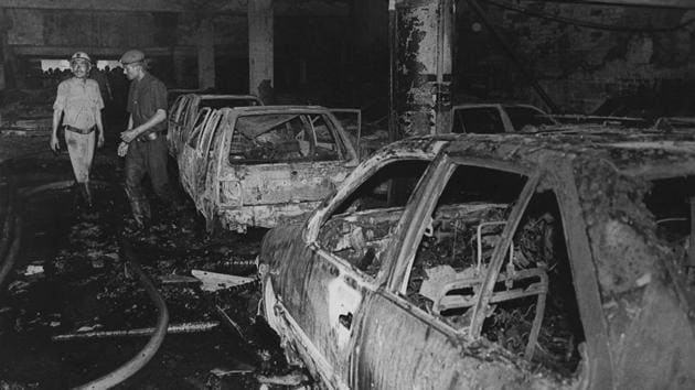Burnt and damaged cars are seen in the basement of the cinema hall on June 13,1997. Investigations carried out by several organisations including CBI revealed negligence on part of the proprietor in following basic fire safety measures. Further investigations revealed that one of the fire exits was blocked to accommodate extra seats trapping people inside. (Prakash Singh / HT Archive) 