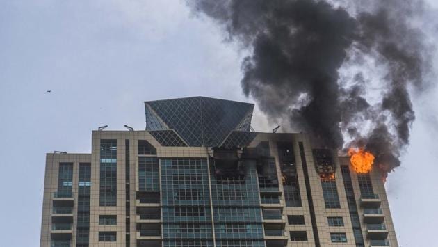 A fire broke out in a high-rise building in south Mumbai on Wednesday afternoon. No casualties are reported. Around 90 residents were evacuated from the building in which Bollywood actor Deepika Padukone reportedly owns an apartment. This is the third major fire to have broken out in Mumbai in the past week. (Pratik Chorge / HT Photo)