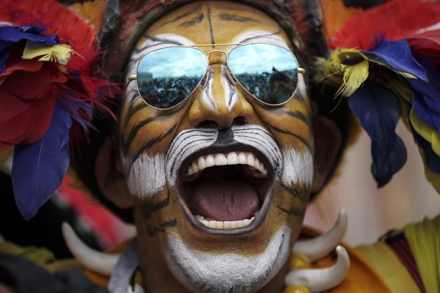 Colombian fan Jose Florentino poses for photos ahead of the 2018 soccer World Cup at a square downtown Moscow, Russia, Wednesday, June 13 (AP) Colombian fan Jose Florentino poses for photos ahead of the 2018 soccer World Cup at a square downtown Moscow, Russia, Wednesday, June 13 (AP)